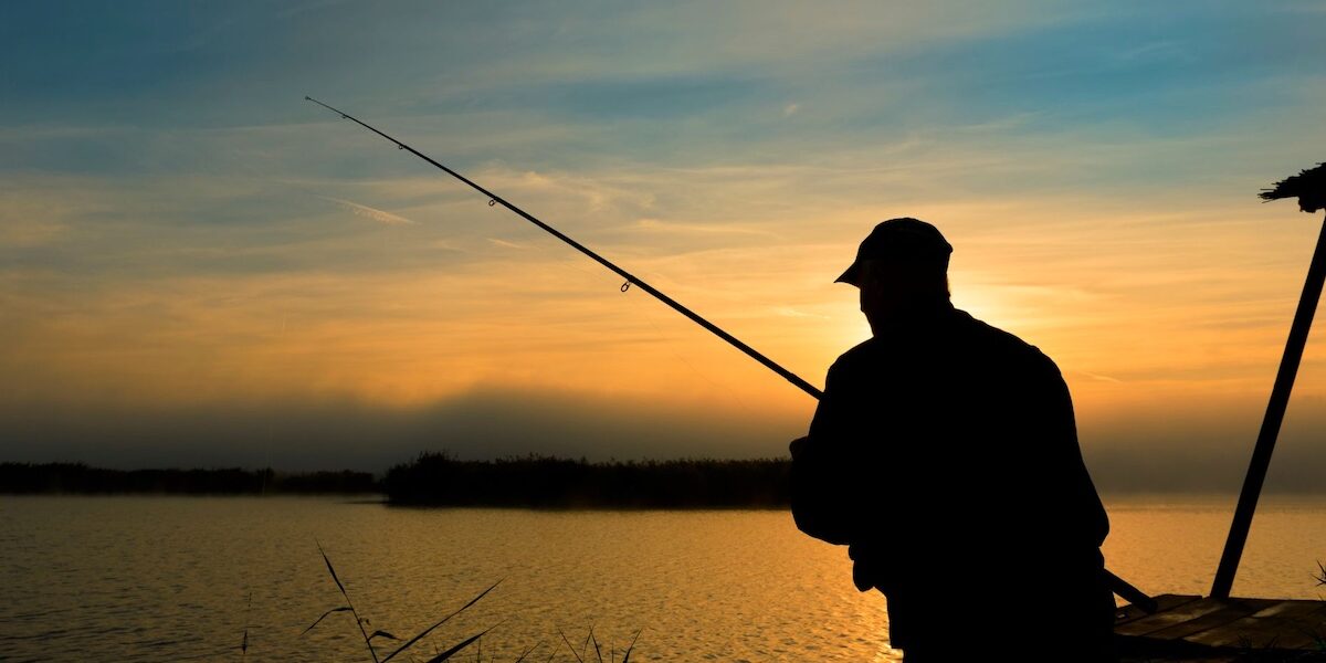 Untitled design – 1 Man fishing at sunrise