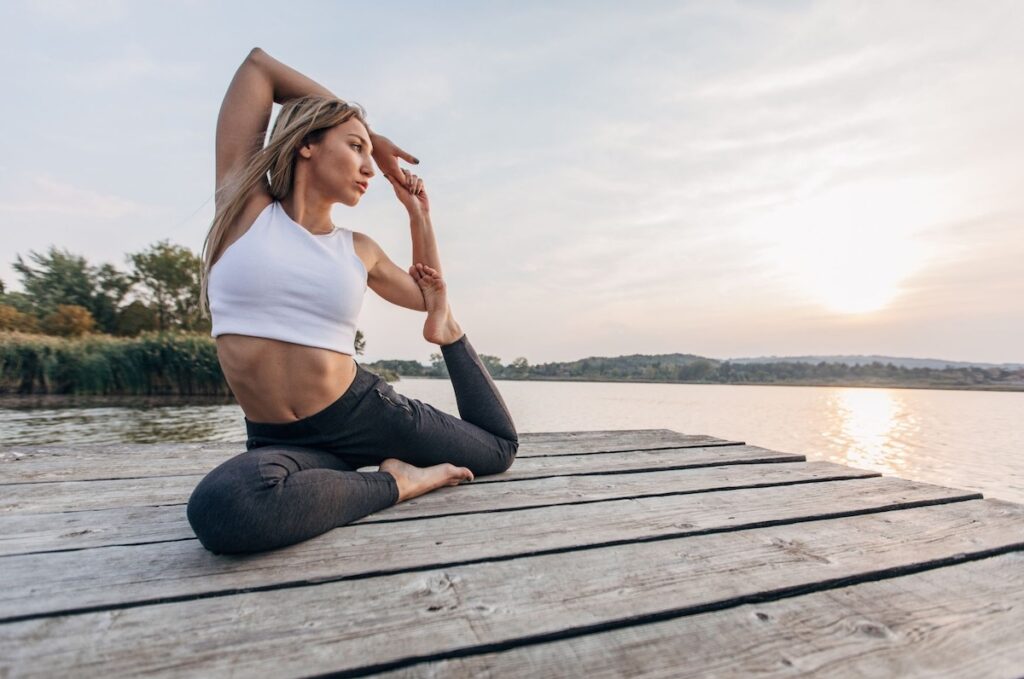 Sunrise yoga by the lake