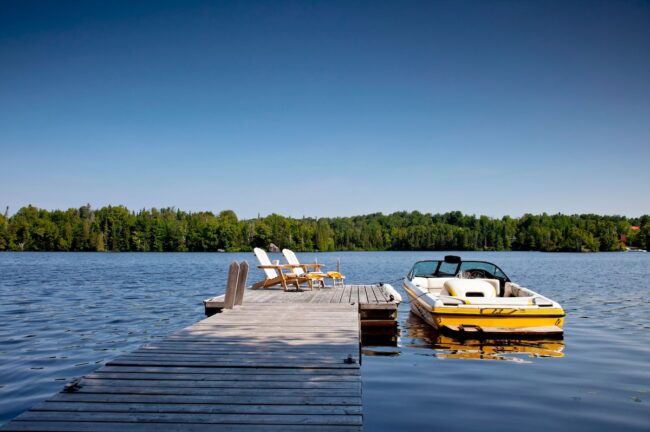 Yellow ski boat and a dock