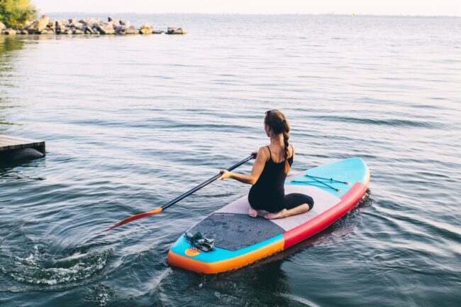 Woman on a paddle board in the water